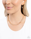 Paparazzi Jewelry Glittery Genre - Gold Necklace - Pure Elegance by Kym