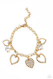 Paparazzi Jewelry GLOW Your Heart - Gold Bracelet - Pure Elegance by Kym