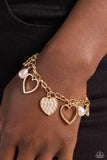 Paparazzi Jewelry GLOW Your Heart - Gold Bracelet - Pure Elegance by Kym